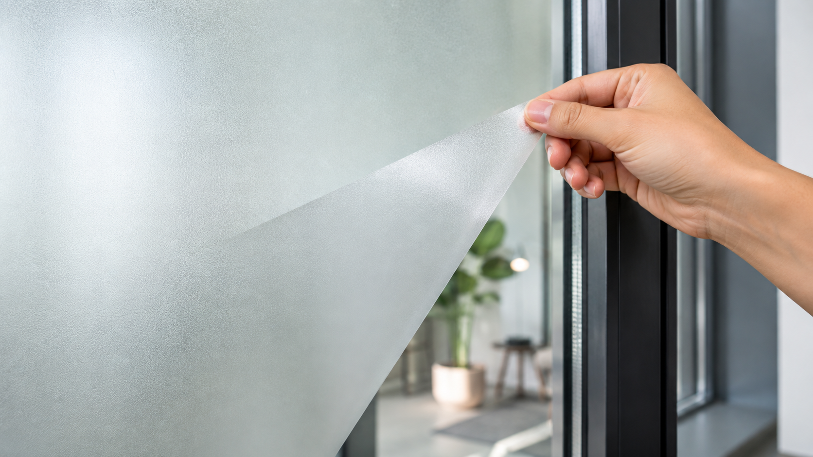Peeling off static cling window film cleanly from glass without adhesive residue
